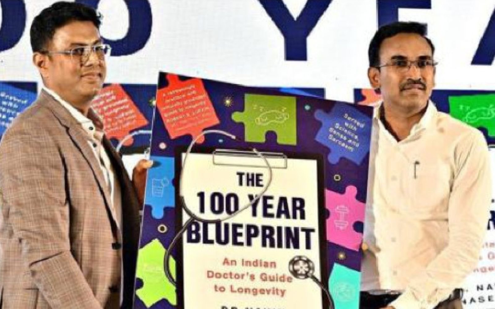 Health Minister K.G. Arunraj and Dr. Navin Gnanasekaran at the book launch